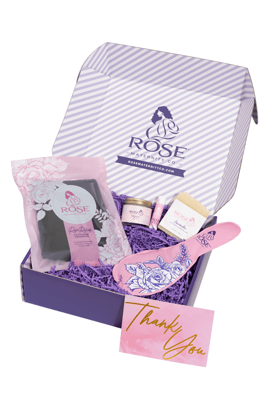 Product image of the Mommy Rejuvenation Box by Rose Maternity Co. featuring postpartum recovery underwear, a reusable ice and heat pack, and cleansing products.